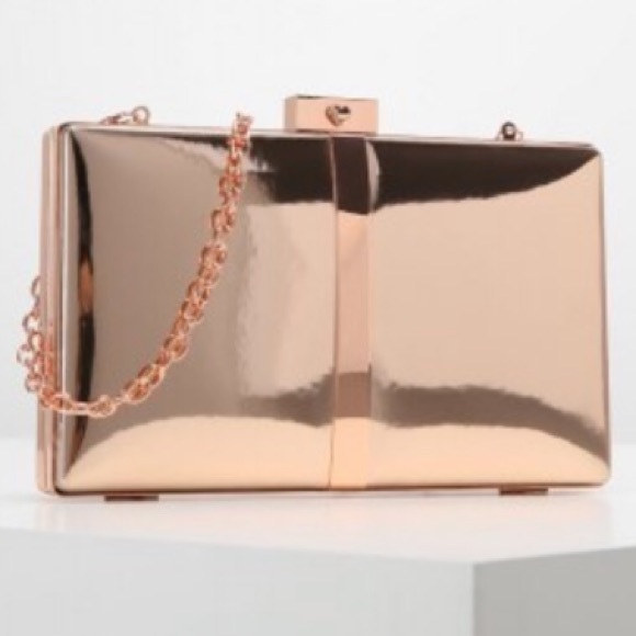 gold patent clutch bag